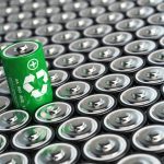 Battery recycling concept. Green energy, Background from battaries and one with green recycling sign. 3d illustration